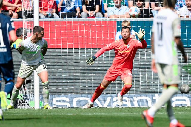 09 May 2026, Baden-Württemberg, Sinsheim: Werder Bremen goalkeeper Mio Backhaus fails to save Hoffemheim's first goal during the German Bundesliga soccer match between TSG 1899 Hoffenheim and Werder Bremen at the PreZero Arena. Photo: Uwe Anspach/dpa - IMPORTANT NOTICE: DFL and DFB regulations prohibit any use of photographs as image sequences and/or quasi-video.