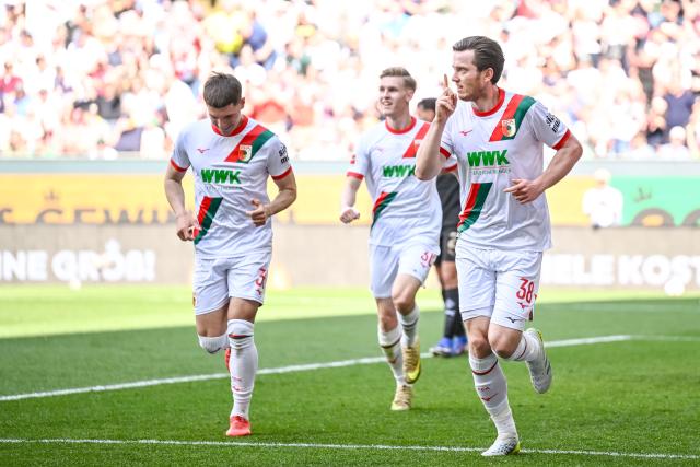 09 May 2026, Bavaria, Augsburg: Augsburg's Michael Gregoritsch celebrates scoring his side's first goal goal during the German Bundesliga soccer match between FC Augsburg and Borussia Moenchengladbach at the WWK-Arena. Photo: Harry Langer/dpa - IMPORTANT NOTICE: DFL and DFB regulations prohibit any use of photographs as image sequences and/or quasi-video.