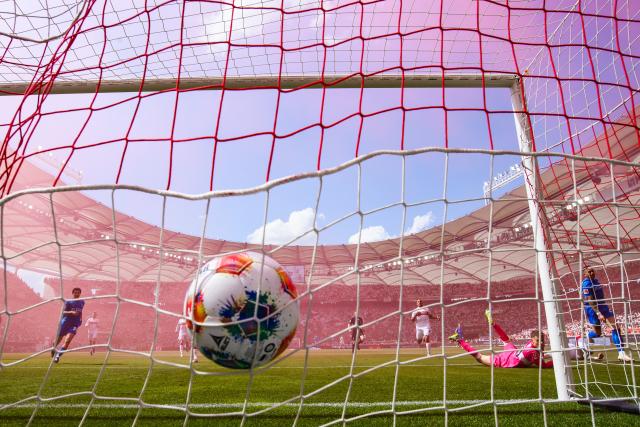 09 May 2026, Stuttgart: Bayer Leverkusen's Aleix Garcia (R) scores his side's first goal past Stuttgart goalkeeper Alexander Nuebel during the German Bundesliga soccer match between VfB Stuttgart and Bayer 04 Leverkusen at the MHPArena. Photo: Tom Weller/dpa - IMPORTANT NOTICE: DFL and DFB regulations prohibit any use of photographs as image sequences and/or quasi-video.