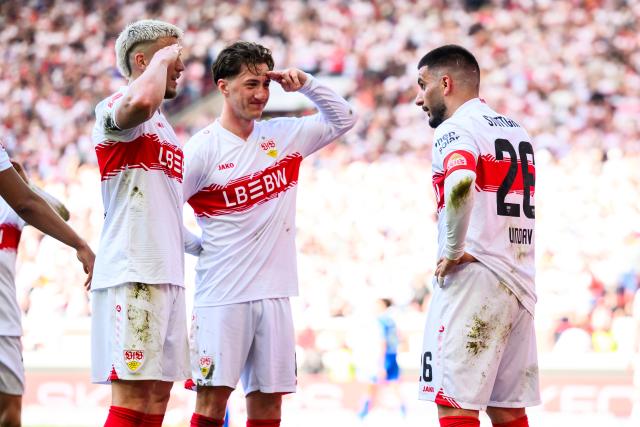 09 May 2026, Stuttgart: Stuttgart's Deniz Undav (R) celebrates scoring his side's third goal with Ermedin Demirovic and Angelo Stiller during the German Bundesliga soccer match between VfB Stuttgart and Bayer 04 Leverkusen at the MHPArena. Photo: Tom Weller/dpa - IMPORTANT NOTICE: DFL and DFB regulations prohibit any use of photographs as image sequences and/or quasi-video.