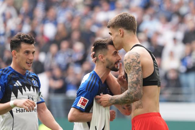 10 May 2026, Hamburg: Hamburger's Luka Vuskovic (R) celebrates scoring his side's second goal with his teammate Nicolas Capaldo during the 
German Bundesliga soccer match between Hamburger SV and SC Freiburg at Volksparkstadion. Photo: Marcus Brandt/dpa - IMPORTANT NOTE: In accordance with the regulations of the DFL German Football League and the DFB German Football Association, it is prohibited to utilize or have utilized photographs taken in the stadium and/or of the match in the form of sequential images and/or video-like photo series.