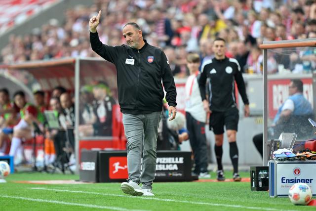 10 May 2026, North Rhine-Westphalia, Cologne: Heidenheim coach Frank Schmidt gestures during the German Bundesliga soccer match between 1.FC Cologne and 1.FC Heidenheim at RheinEnergieStadion. Photo: Ulrich Hufnagel/dpa - IMPORTANT NOTE: In accordance with the regulations of the DFL German Football League and the DFB German Football Association, it is prohibited to utilize or have utilized photographs taken in the stadium and/or of the match in the form of sequential images and/or video-like photo series.