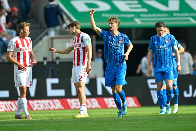 10 May 2026, North Rhine-Westphalia, Cologne: Heidenheim's Jan Schoeppner celebrates scoring his side's first goal during the German Bundesliga soccer match between 1.FC Cologne and 1.FC Heidenheim at RheinEnergieStadion. Photo: Ulrich Hufnagel/dpa - IMPORTANT NOTE: In accordance with the regulations of the DFL German Football League and the DFB German Football Association, it is prohibited to utilize or have utilized photographs taken in the stadium and/or of the match in the form of sequential images and/or video-like photo series.