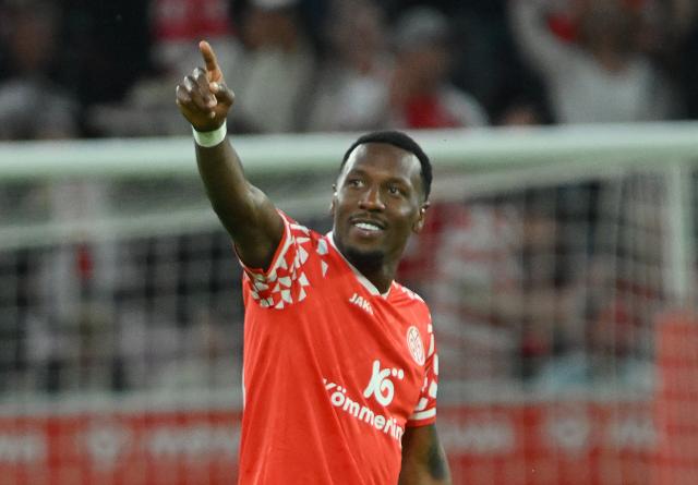 10 May 2026, Rhineland-Palatinate, Mainz: Mainz' Sheraldo Becker celebrates scoring his side's first goal during the German Bundesliga soccer match between FSV Mainz 05 and 1.FC Union Berlin at Mewa Arena. Photo: Torsten Silz/dpa - IMPORTANT NOTE: In accordance with the regulations of the DFL German Football League and the DFB German Football Association, it is prohibited to utilize or have utilized photographs taken in the stadium and/or of the match in the form of sequential images and/or video-like photo series.