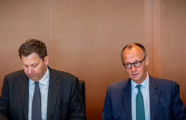 13 May 2026, Berlin: German Chancellor Friedrich Merz (R) speaks next to Lars Klingbeil, German Minister of Finance, at the start of the German Cabinet meeting in the Chancellery. Photo: Michael Kappeler/dpa