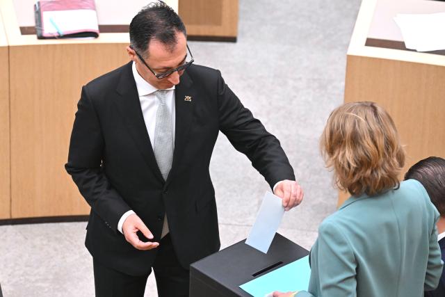 13 May 2026, Baden-Württemberg, Stuttgart: Cem Ozdemir, designated Minister President of Baden-Wuerttemberg, casting his vote in the state parliament. Ozdemir is to be elected as the new Minister President of Baden-Wuerttemberg in the state parliament. Photo: Bernd Weißbrod/dpa