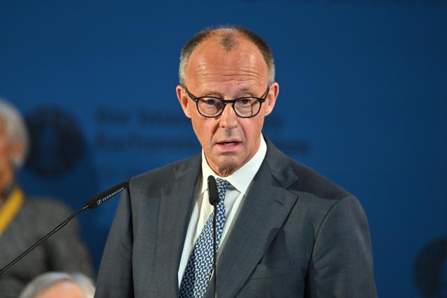 14 May 2026, North Rhine-Westphalia, Aachen: German Chancellor Friedrich Merz delivers a speech during the Charlemagne Prize award ceremony in Aachen City Hall. Former President of the European Central Bank (ECB), Mario Draghi, is to be awarded the Charlemagne Prize 2026. Photo: Henning Kaiser/dpa