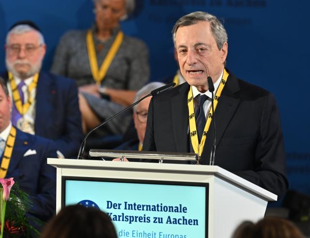 14 May 2026, North Rhine-Westphalia, Aachen: Former President of the European Central Bank (ECB) Mario Draghi, delivers a speech after being awarded with the Charlemagne Prize in Aachen City Hall. Photo: Henning Kaiser/dpa