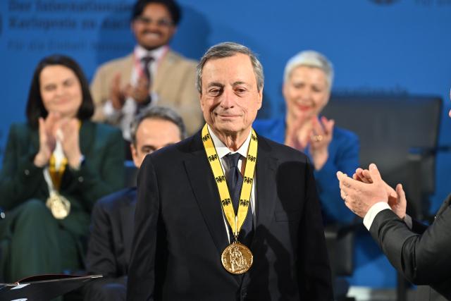 14 May 2026, North Rhine-Westphalia, Aachen: Former President of the European Central Bank (ECB) Mario Draghi is awarded with the Charlemagne Prize in Aachen City Hall. Photo: Henning Kaiser/dpa