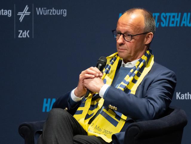 15 May 2026, Bavaria, Würzburg: German Chancellor Friedrich Merz takes part in a panel discussion at the 104th German Catholic Day under the motto "Shaping the future together". Photo: Sven Hoppe/dpa - ATTENTION: For editorial use only and only with full reference to the above credit