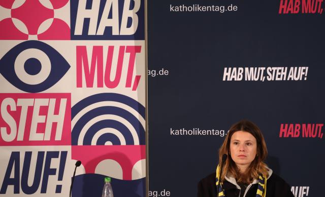 16 May 2026, Bavaria, Wuerzburg: Luisa Neubauer, climate protection activist, sits at a press conference at the German Catholic Day. Photo: Karl-Josef Hildenbrand/dpa - ATTENTION: For editorial use only and only with full reference to the above credit