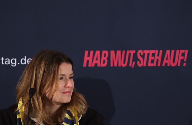 16 May 2026, Bavaria, Wuerzburg: Luisa Neubauer, climate protection activist, sits at a press conference at the German Catholic Day. Photo: Karl-Josef Hildenbrand/dpa - ATTENTION: For editorial use only and only with full reference to the above credit