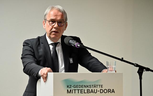FILED - 13 April 2026, Thuringia, Nordhausen: FILE PHOTO - Minister of the Interior of Thuringia Georg Maier speaks during the commemoration ceremony at the Mittelbau-Dora concentration camp memorial site on the 81st anniversary of the liberation of the Mittelbau-Dora concentration camp near Nordhausen. Photo: Martin Schutt/dpa