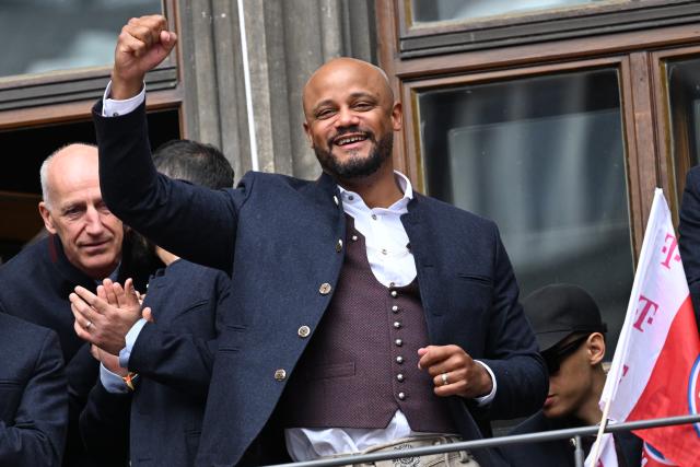 17 May 2026, Bavaria, Munich: Bayern Munich coach Vincent Kompany celebrates on the town hall balcony during the German Bundesliga championship celebrations at Marienplatz. Photo: Sven Hoppe/dpa