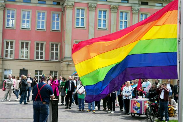 18 May 2026, Brandenburg, Potsdam: The rainbow flag is raised in the courtyard of the Brandenburg State Parliament to mark the International Day against Homo-, Bi-, Inter- and Transphobia. Photo: Sven Kaeuler/dpa
