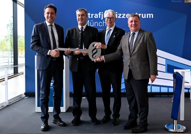 18 May 2026, Bavaria, Munich: (L-R) Georg Eisenreich, Bavarian Minister of Justice, Hans-Joachim Hessler, President of the Bavarian Constitutional Court, Markus Soeder, Minister-President of Bavaria, and Christian Bernreiter, Bavarian Minister of Housing, Construction, and Transportation, attend the inauguration ceremony for the new Criminal Justice Center. Photo: Sven Hoppe/dpa