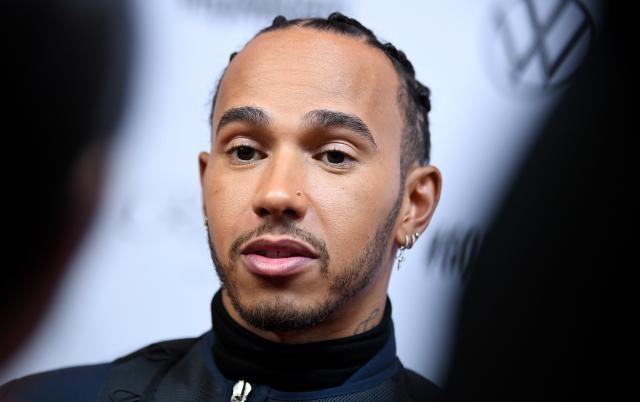 FILED - 07 November 2019, Berlin: FILE PHOTO - British Formula One driver Lewis Hamilton of Mercedes AMG Petronas team, speaks at the presentation of the GQ Men of the Year Awards. Photo: Britta Pedersen/dpa-Zentralbild/dpa