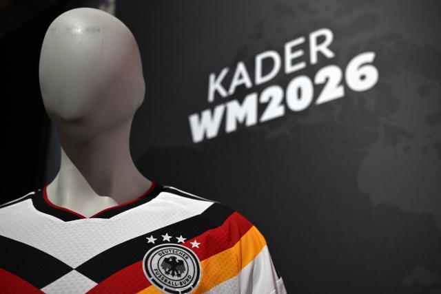 21 May 2026, Hesse, Frankfurt: A mannequin displays the home kit of the German national football team for the upcoming 2026 World Cup during a press conference in Frankfurt. The announcement of the official tournament squad comes ahead of the global showpiece, which takes place in Canada, Mexico and the United States from 11 June to 19 July 2026. Photo: Federico Gambarini/dpa