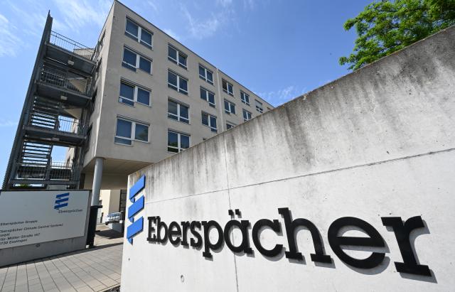 FILED - 24 May 2023, Esslingen: FILE PHOTO - The logo of the automotive supplier Eberspaecher in front of the company's headquarters in Esslingen. Photo: Bernd Weißbrod/dpa