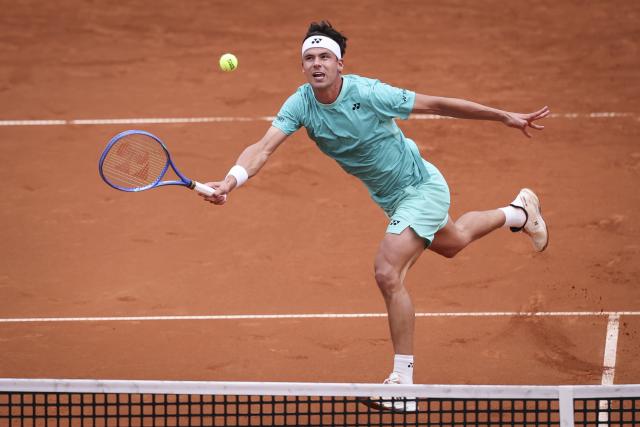 21 May 2026, Hamburg: German tennis player Daniel Altmaier plays a forehand return against USA's Tommy Paul during their Men's Singles Quarterfinals tennis match. Photo: Christian Charisius/dpa
