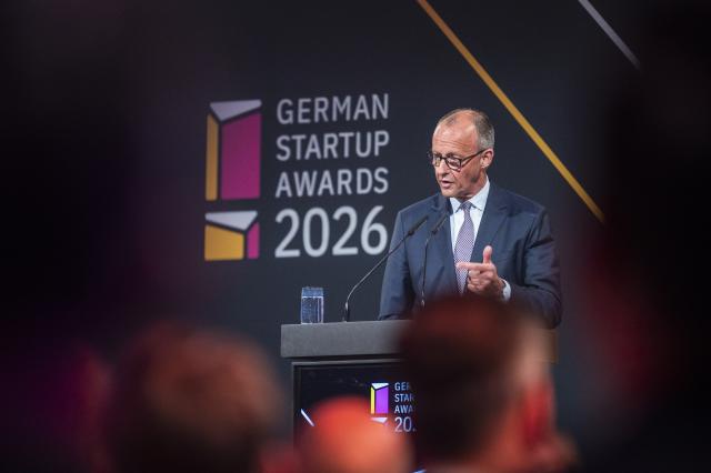 21 May 2026, Berlin: Germany's Chancellor Friedrich Merz speaks at the 'German Startup Awards 2026' ceremony. Photo: Christophe Gateau/dpa