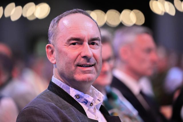 21 May 2026, Bavaria, Munich: Hubert Aiwanger, Bavarian Minister of State for Economic Affairs, Regional Development, and Energy, claps during the 2026/27 Bavarian Beer Queen pageant at the Loewenbraeukeller. Photo: Felix Hörhager/dpa
