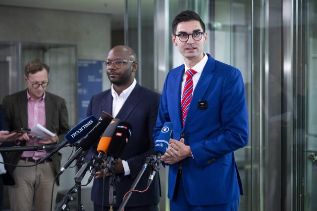 22 May 2026, Berlin: Sepp Mueller (R) and Armand Zorn (C), chairmen of the coalition task force, speak during a press briefing following a meeting on rising energy and fuel prices resulting from the war in Iran. Photo: Christophe Gateau/dpa