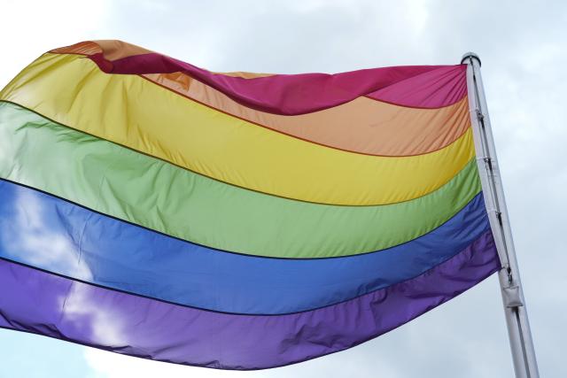FILED - 18 May 2026, Potsdam: FILE PHOTO - The rainbow flag flies in the wind in the courtyard of the Brandenburg State Parliament. Photo: Sven Kaeuler/dpa