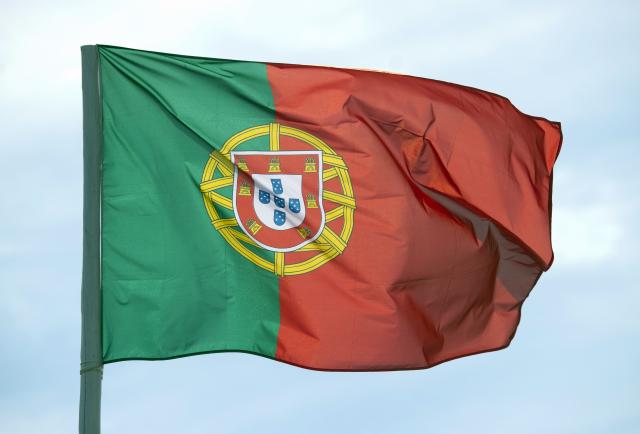 FILED - 26 May 2011, Brandenburg, Klettwitz: FILE PHOTO - The Portuguese national flag is pictured in Klettwitz. Photo: Patrick Pleul/dpa