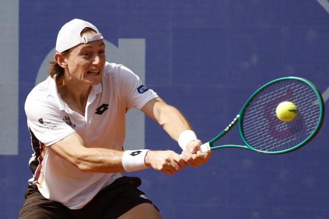 23 May 2026, Hamburg: Peruvian tennis player Ignacio Buse plays a backhand return against USA's Tommy Paul during their Men's Singles final tennis match of the Hamburg Open tennis tournament. Photo: Georg Wendt/dpa