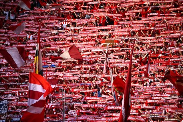 23 May 2026, Berlin: Bayern Munich fans celebrate ahead of the German DFB Cup Final soccer match between Bayern Munich and VfB Stuttgart at Berlin Olympic Stadium. Photo: Tom Weller/dpa