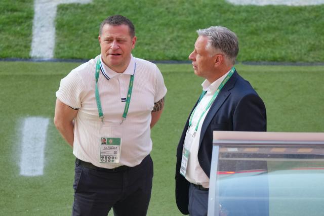 23 May 2026, Berlin: Bayern Munich's sporting director Max Eberl (L) ahead of the German DFB Cup Final soccer match between Bayern Munich and VfB Stuttgart at Berlin Olympic Stadium. Photo: Soeren Stache/dpa