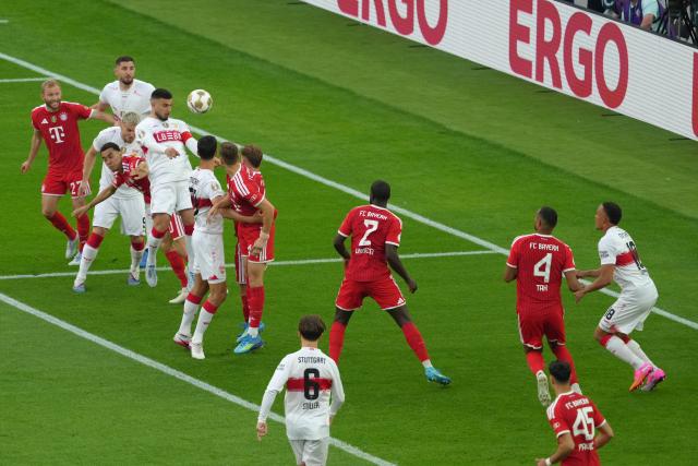 23 May 2026, Berlin: Stuttgart's Ameen Al-Dakhil (5th L) goes for a header during the German DFB Cup Final soccer match between Bayern Munich and VfB Stuttgart at Berlin Olympic Stadium. Photo: Soeren Stache/dpa