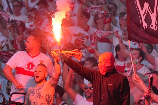 23 May 2026, Berlin: Stuttgart fans set off pyrotechnics during the German DFB Cup Final between Bayern Munich and VfB Stuttgart at the Olympic Stadium in Berlin. Photo: Michael Kappeler/dpa