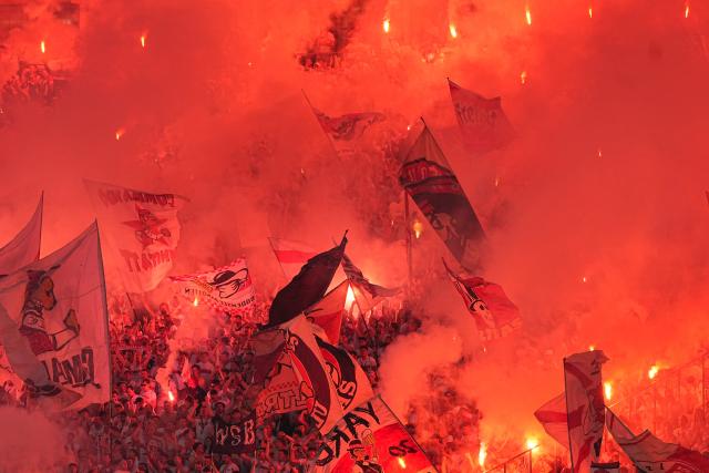 23 May 2026, Berlin: Stuttgart fans set off fireworks during the German DFB Cup Final between Bayern Munich and VfB Stuttgart at the Olympic Stadium in Berlin. Photo: Michael Kappeler/dpa