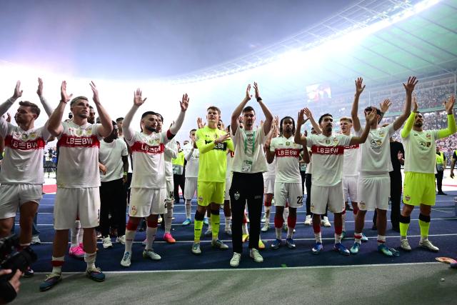 23 May 2026, Berlin: The VfB Stuttgart players thank their fans after losing the German DFB Cup Final to Bayern Munich at the Olympic Stadium in Berlin. Photo: Sebastian Gollnow/dpa