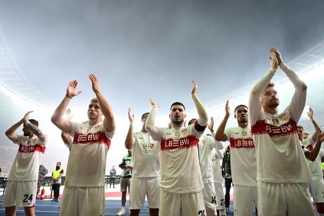 23 May 2026, Berlin: The VfB Stuttgart players thank their fans after losing the German DFB Cup Final to Bayern Munich at the Olympic Stadium in Berlin. Photo: Sebastian Gollnow/dpa