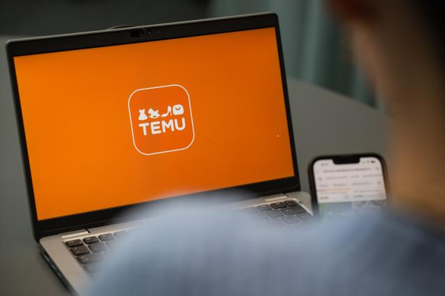 FILED - 29 August 2023, Berlin: FILE PHOTO - A view of a laptop with the Temu app logo. Photo: Hannes P Albert/dpa