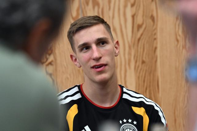 28 May 2026, Bavaria, Herzogenaurach: Germany's Nico Schlotterbeck speaks during the team's press conference ahead of the 2026 FIFA World Cup kick off match against Curacao in Houston. Photo: Federico Gambarini/dpa