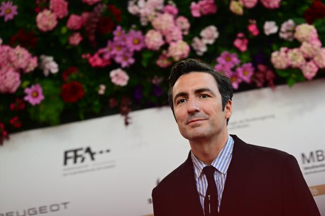 29 May 2026, Berlin: German film director Ilker Catak arrives at the Palais am Funkturm for the German Film Awards ceremony. Photo: Sebastian Gollnow/dpa
