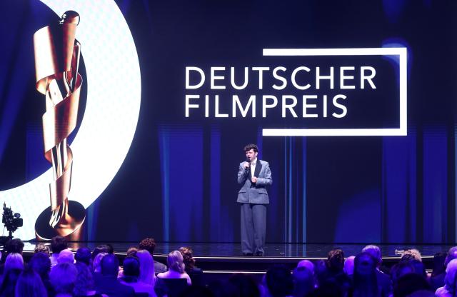 29 May 2026, Berlin: German actor and singer Christian Friedel hosts the German Film Awards ceremony at the Palais am Funkturm. Photo: Christoph Soeder/dpa