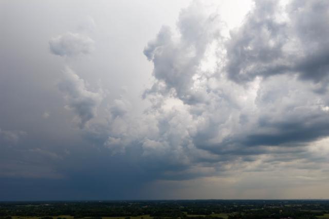 29 May 2026, Bremen: Dark clouds seen over the fields during a storm in Bremen. Photo: Sina Schuldt/dpa