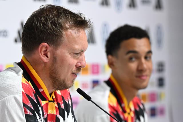 30 May 2026, Bavaria, Herzogenaurach: Germany head coach Julian Nagelsmann and player Jamal Musiala speak during a press conference ahead of Sunday's international friendly against Finland. Photo: Federico Gambarini/dpa - IMPORTANT NOTE: In accordance with the regulations of the DFL German Football League and the DFB German Football Association, it is prohibited to utilize or have utilized photographs taken in the stadium and/or of the match in the form of sequential images and/or video-like photo series.
