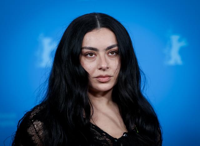FILED - 14 February 2026, Berlin: FILE PHOTO - British singer-songwriter and actress Charli xcx poses during a photo call for the film "The Moment" at the Berlin International Film Festival. Photo: Soeren Stache/dpa