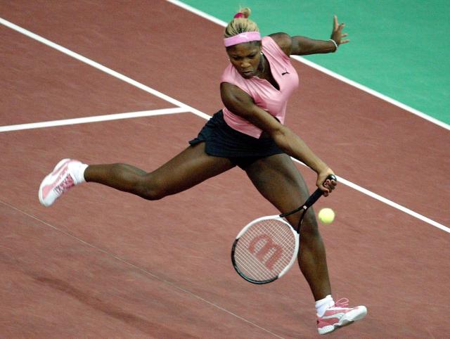 FILED - 25 September 2002, Saxony, Leipzig: FILE PHOTO - US tennis player Serena Williams plays a forehand during a match at the 13th International Sparkassen Cup WTA Tournament in Leipzig. Photo: Jörg-Florian Eisele/dpa-Zentralbild/dpa
