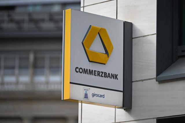 FILED - 16 March 2026, Hesse, Frankfurt/Main: FILE PHOTO - A logo is displayed on the faCade of a Commerzbank branch. Photo: Michael Brandt/dpa