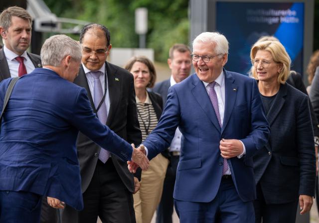03 June 2026, Saarland, Blieskastel: German President Frank-Walter Steinmeier (L) welcomes an international delegate at the Voelklingen Ironworks UNESCO World Heritage Site in Voelklingen. Photo: Harald Tittel/dpa
