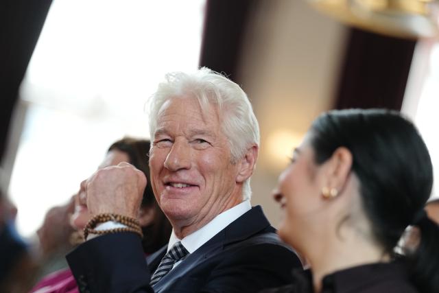 04 June 2026, Berlin: German Minister for Economic Cooperation and Development, Reem Alabali Radovan and US actor Richard Gere take part in an event at the Hertie School to present the at the Hertie School to present the "Joint Initiative on Migration". The initiative is based at the Hertie School's Center for Fundamental Rights and was launched together with the Gere Foundation. It examines state approaches - such as in the areas of migration, border control and development aid - as well as their effects and the interplay between these areas. Photo: Kay Nietfeld/dpa