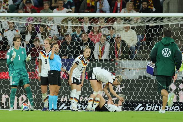 05 June 2026, North Rhine-Westphalia, Cologne: Germany's Elisa Senss (bottom)
lies injured on the ground during the UEFA Women's Euro Qualifiers soccer match between Germany and Norway at the RheinEnergieStadion. Photo: Rolf Vennenbernd/dpa
