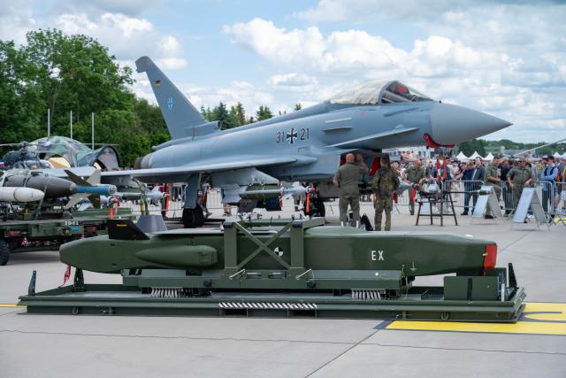 06 June 2026, Mecklenburg-Western Pomerania, Laage: A Taurus (cruise missile) is displayed in front of a German Air Force Eurofighter at Bundeswehr Day at Laage Air Base, home to Tactical Air Force Wing 73 "Steinhoff." Photo: Stefan Sauer/dpa